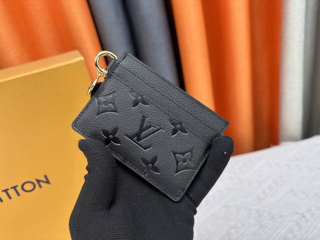 M13649 This sophisticated Lv Charms business card holder is a great addition to