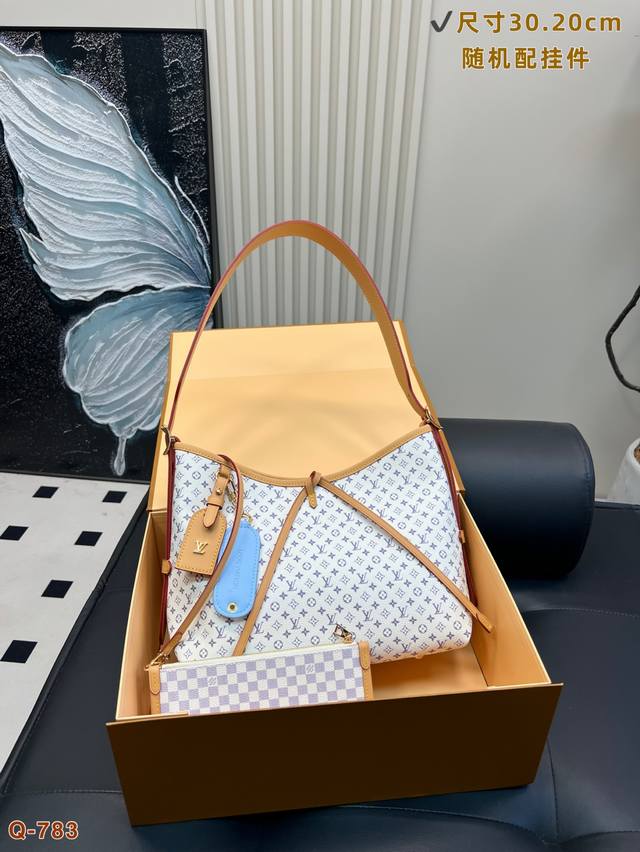 with folding box The Lvcarryall family has a new member. Cream white monogram. H