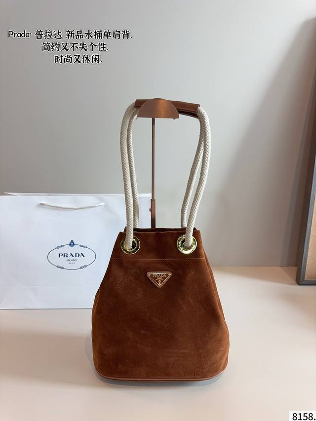 Prada suede underarm bucket bag Easily interprets retro fashion The bag is wide