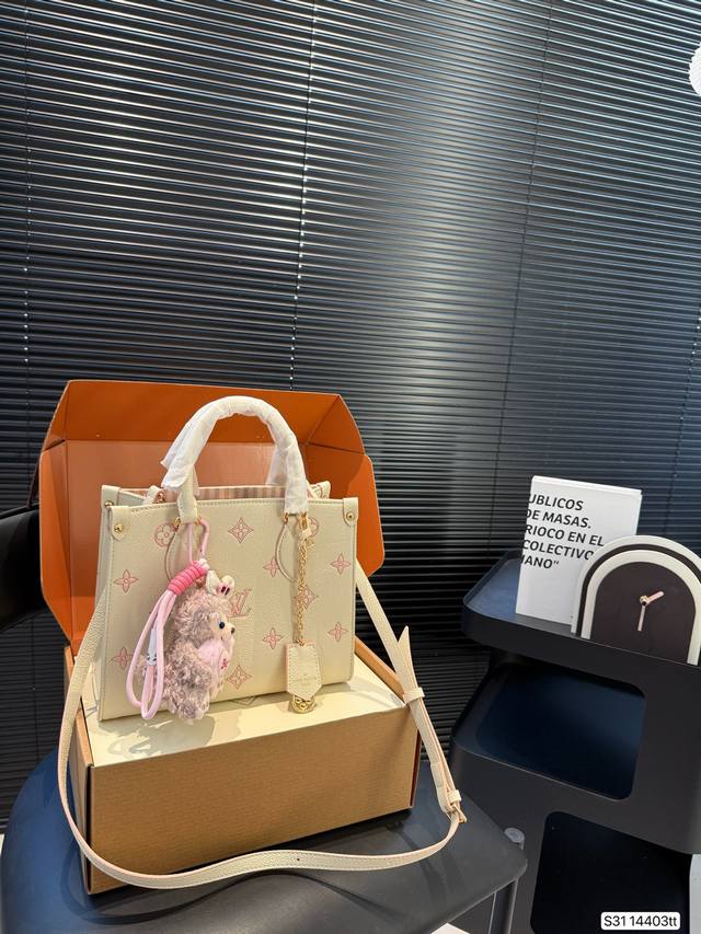 with folding box Lv Onthego Tote has simple and neat lines, the bag is very styl