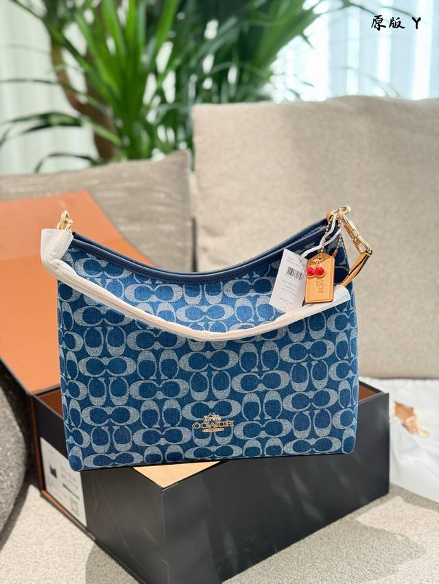 Coach Who understands the beauty of the new Laurel hobo bag The denim color is r