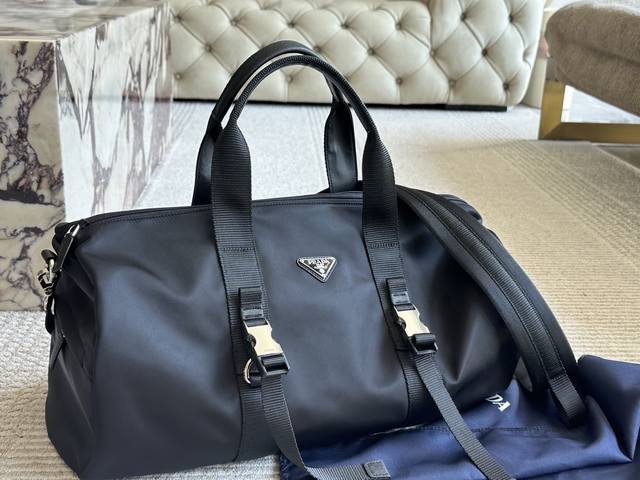 Without box Size: 50*25Cm A versatile and durable Prad black travel bag You need