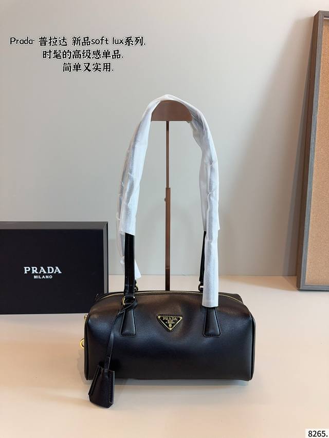 Prada's new Soft Lox shoulder bag. Can be carried by hand or worn cross-body Fas