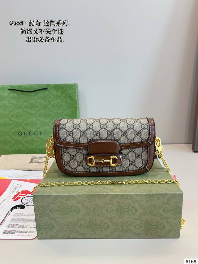 with gift box Gucci 1955 retro baguette bag. A new member of the Gucci 1955 fami