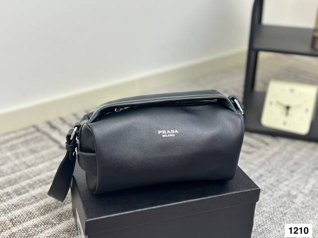 Prada's new shoulder bag. Can be carried by hand or worn cross-body Fashion's ne