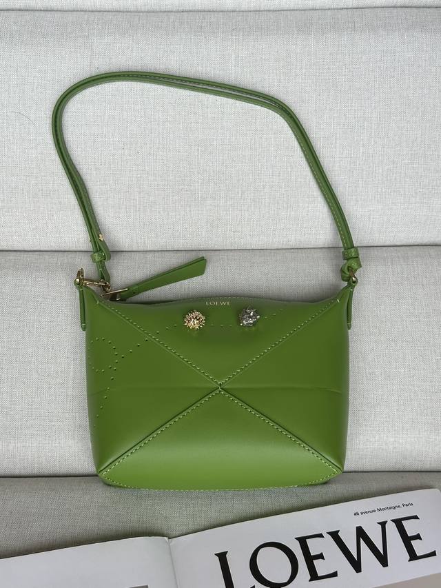 Original leather July Eve limited edition Puzzle Fold Pouch handbag reinterprets