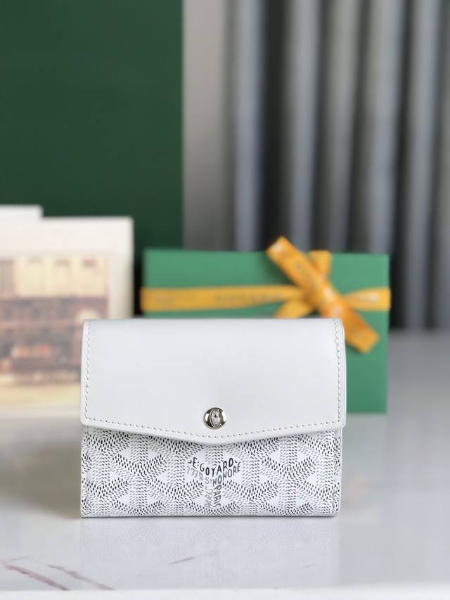 Genuine Saint-Gabriel is a unique envelope-shaped tri-fold wallet made of Goyar