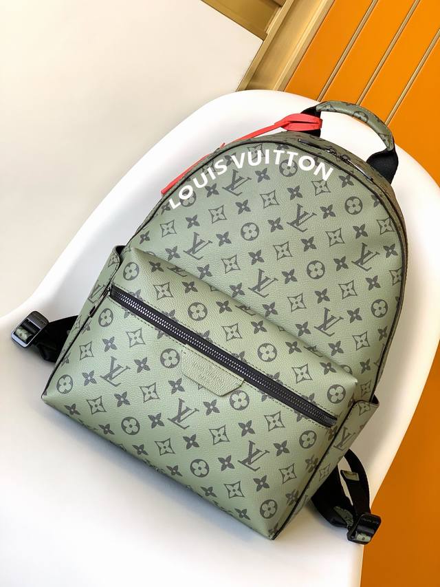 M46802Green Backpack Collection This Zly Discovery Small Backpack is made of Mon