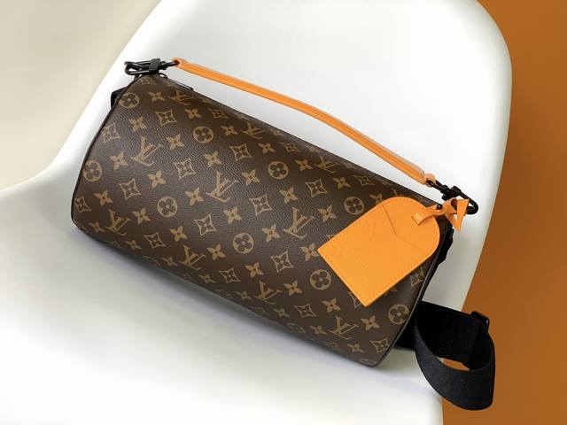 M46691 Premium Original Soft Polochon Handbag combines Monogram Macassar canvas