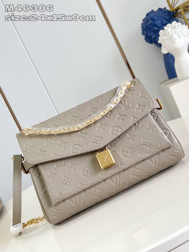 Top original home shot M14604 gray M14973 This Anytime Flap Bag is made of Mono