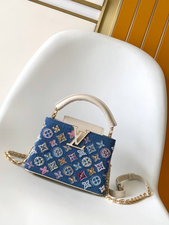M12947 Super Original Dynamic 163 This Capucines mini handbag is made of Monogra