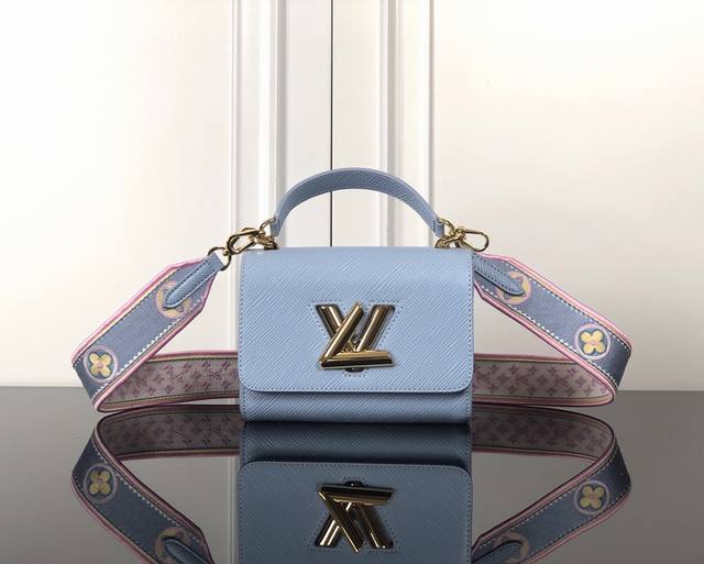 M22515Powder blue top original This small Twist bag is made of Epi grain leather