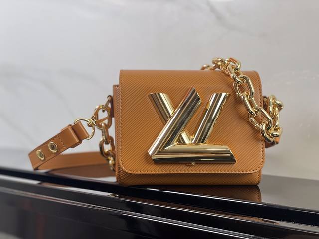 M22296 Brown top original Twist new Reinterpreting the classic Lv handbag throug