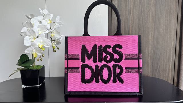 New Stamp Series This Book Tote handbag is designed by Maria Grazia Chiuri, Cre