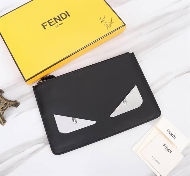 Brand: Fendi Model: Stainless Steel Clutch Item No.: 168568 Color: Black + Silve