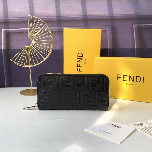 Style No. F7M0210 Embossed black, zippered wallet with 8 card slots and 1 zippe