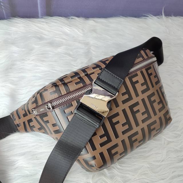 Style No. 7Va434 Embossed coffee color, zipper closure waist bag, adjustable be