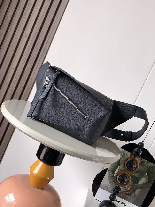 New small classic cow leather Puzzle waist bag. The rectangular shape and preci