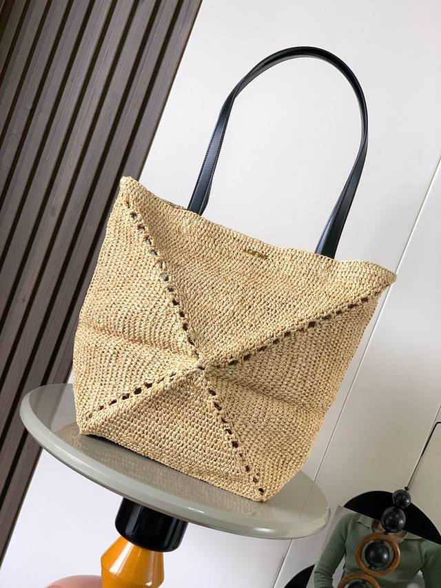 Popular Medium Raffia Puzzle Fold Handbag The Puzzle Fold features a lightweight