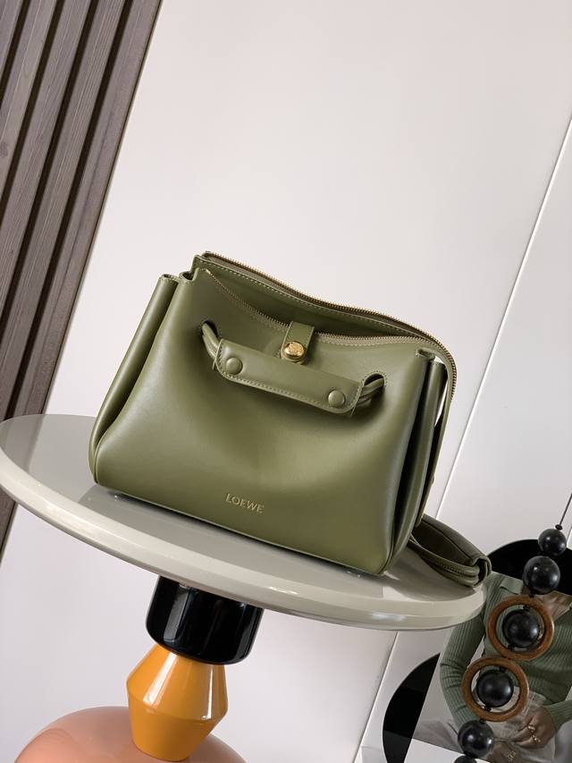 Small Soft Calfskin Madrid HandbagMadrid has a soft structured trapezoidal shape