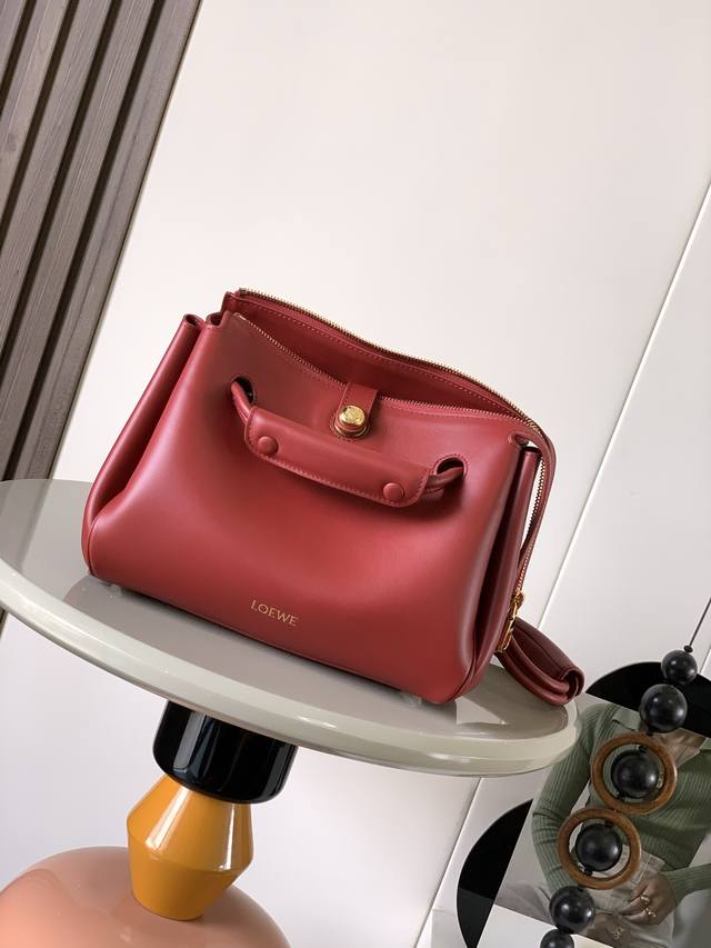 Small soft cowhide leather Madrid handbag Madrid has a soft structured trapezoid