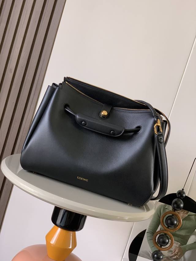Large Soft Calfskin Madrid HandbagMadrid has a soft structured trapezoidal shape