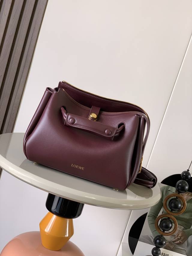 Small Soft Calfskin Madrid HandbagMadrid has a soft structured trapezoidal shape