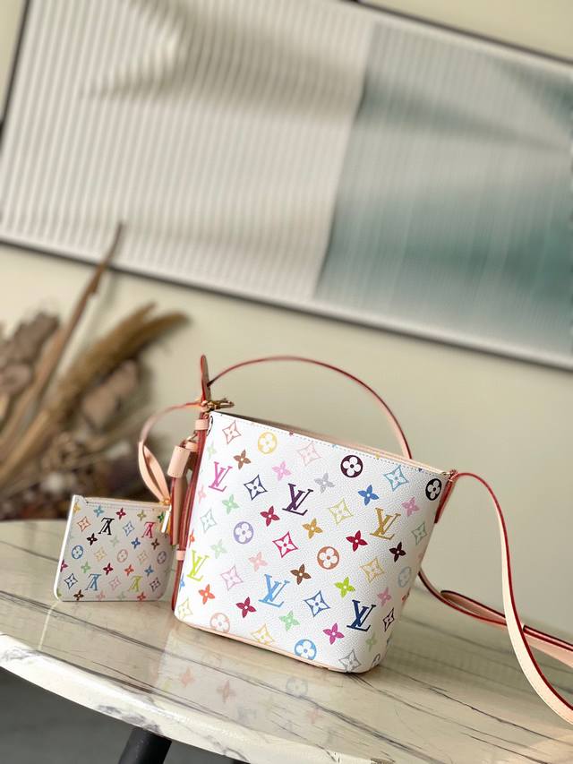 Top Original M13089 This Alnbb bag conveys the playful style of the Louis Vuitt