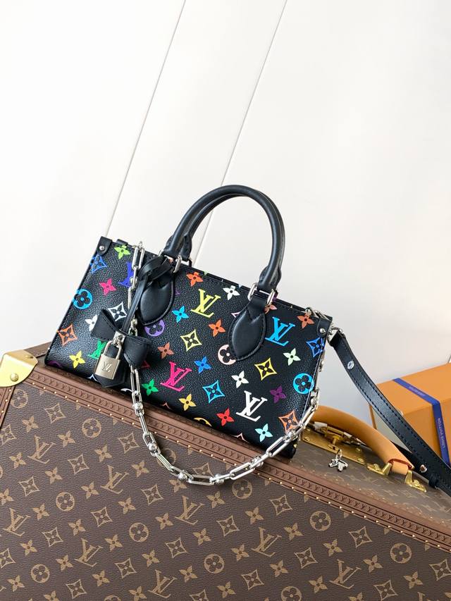 Top original order, variable chip M13260 This Onthego East West handbag is made