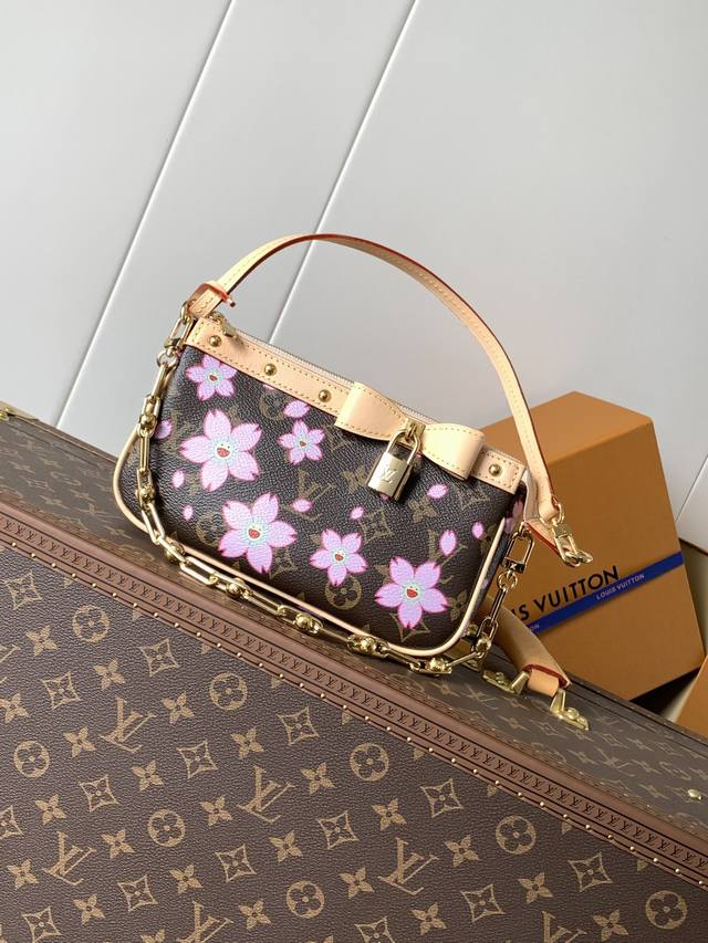 top original, variable chip M13666 This Pochette Accessoires handbag is a class