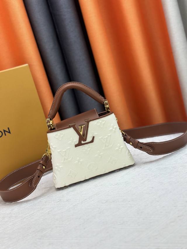 Exclusive photo of white embossed color matching M59939 M94519 Capucines handba