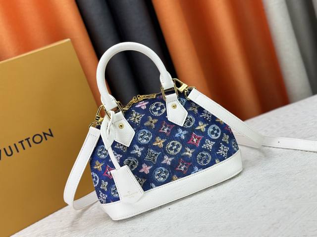 Upgraded M53152 Denim This charming Alma Bb bag is inspired by a Louis Vuitton