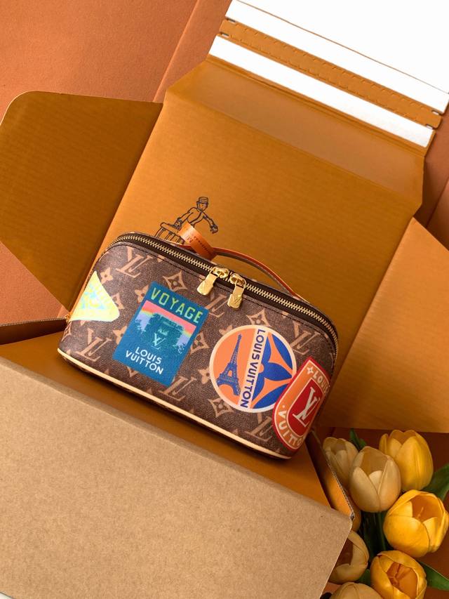 M14744 This 2 Compartments toiletry bag is made of Monogram coated canvas with c