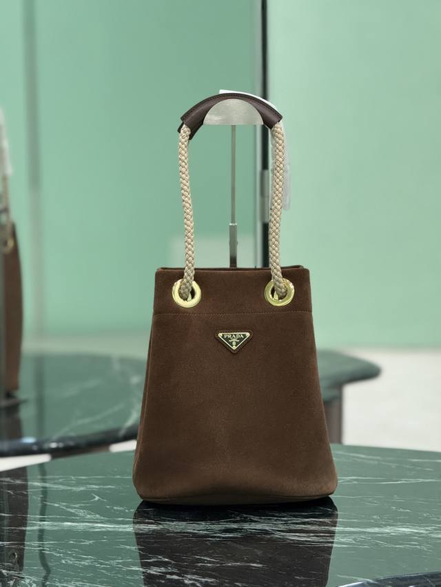 Genuine New Bucket Bag This Re-Nylon handbag is designed with imported suede fa