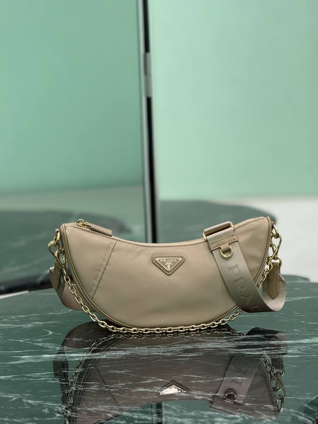 Authentic New Crescent Bag This Re-Nylon bag is made of recycled nylon fabric, e