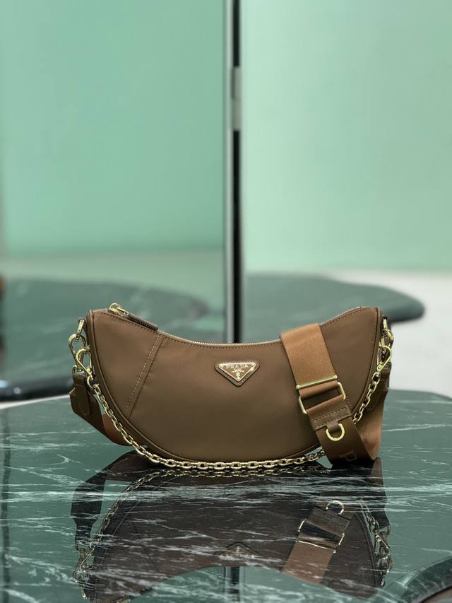 Authentic New Crescent Bag This Re-Nylon bag is made of recycled nylon fabric, e