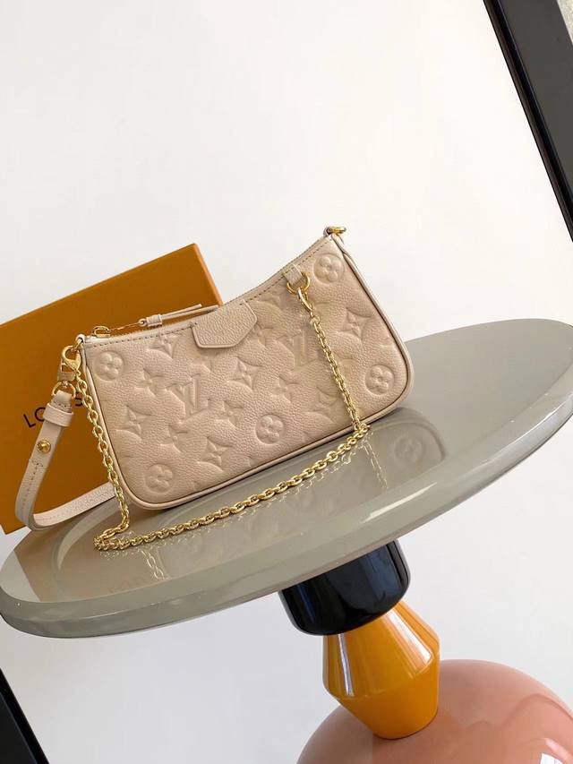 Top original 14421M80349 Dune color This Easy Pouch handbag is a leather bag wi