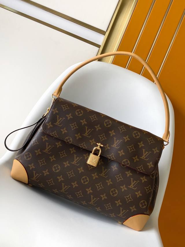 M14473 Top Original Dynamic 163 The Hide Away handbag is made of Monogram coated