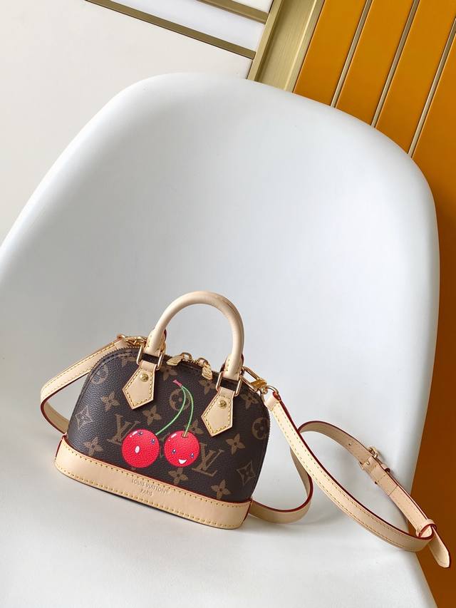 M13416 Top Original Dynamic 163 This compact Nano Alma features a playful cherry