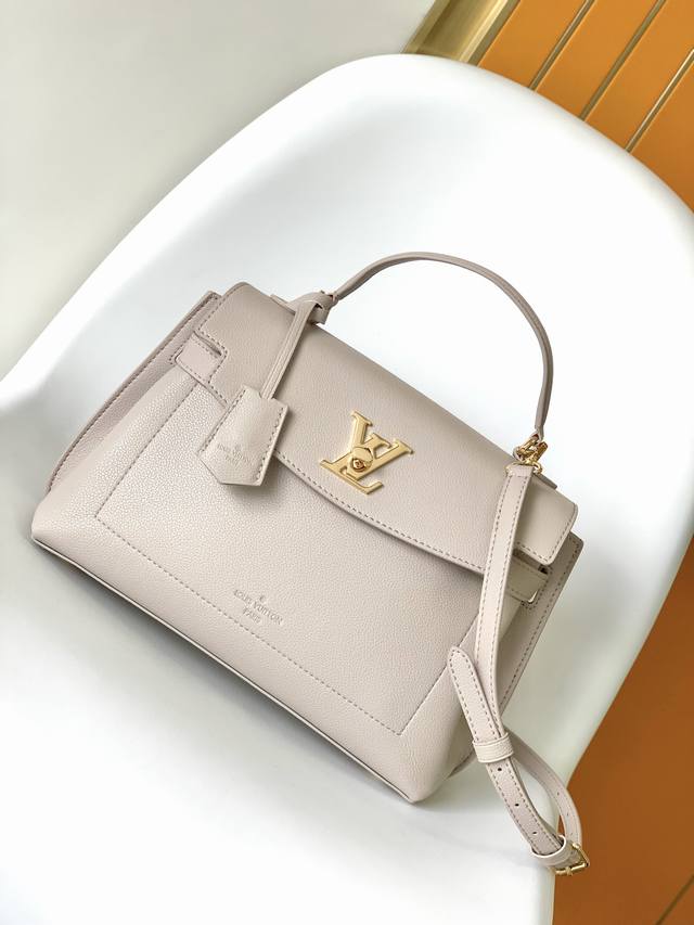 M51395BlackM56094GrayTop Original This Lockme Ever single handle handbag is made