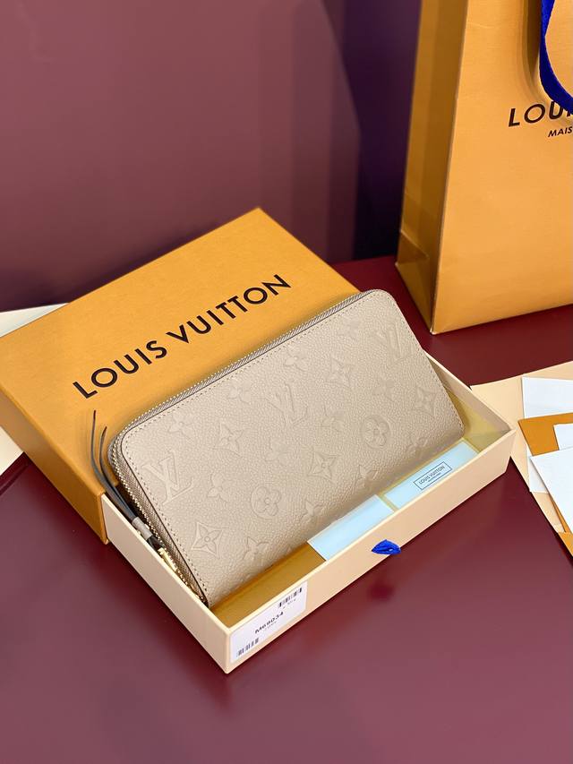 Factory Price P M69034 Apricot! The classic Zippy zipper wallet is made of deli