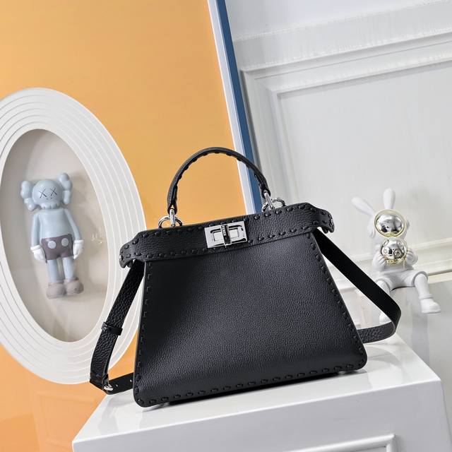 Model 0057 Details: Black hand stitching, medium Peekabooiseeu handbag, lychee