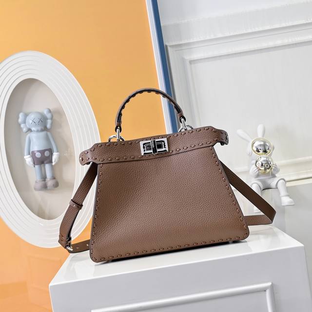 Model 0057 Details: Black hand stitching, medium Peekabooiseeu handbag, lychee