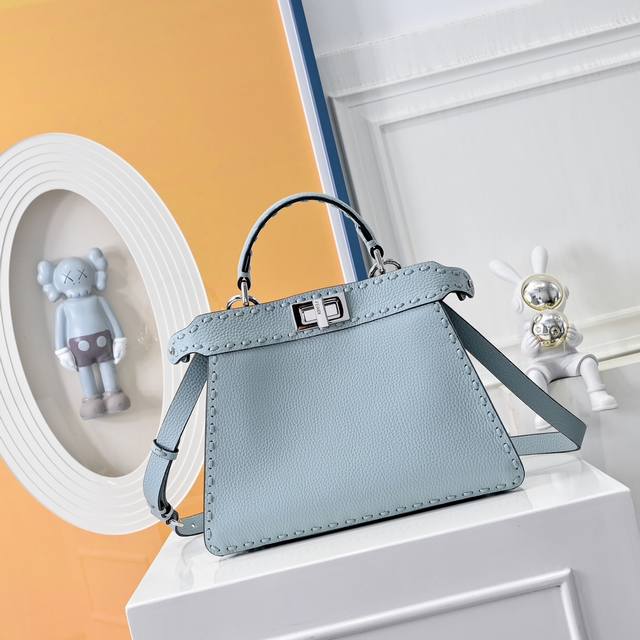 Model 0057 Details: Black hand stitching, medium Peekabooiseeu handbag, lychee