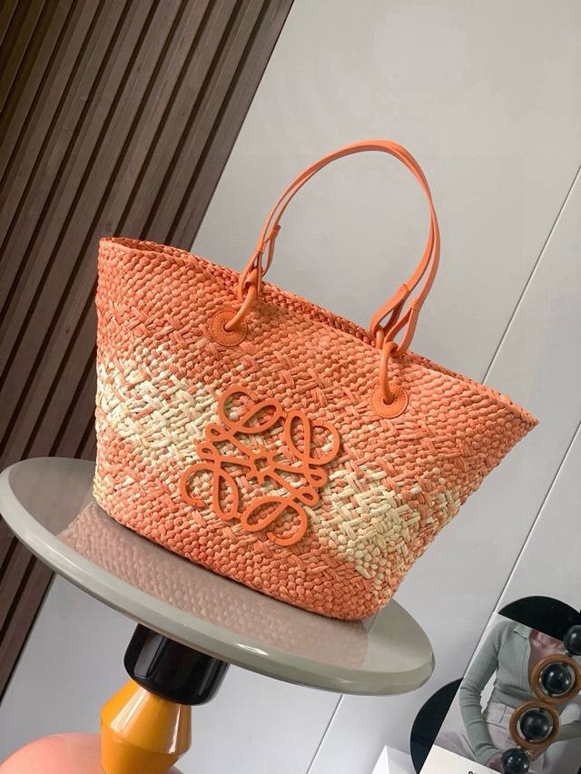 Large Iraca Palm Fiber and Cow Leather Anagram Basket Handbags. Many celebritie