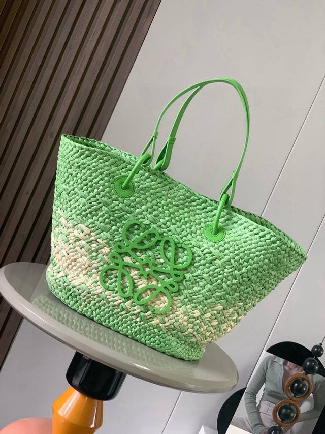Large Iraca Palm Fiber and Cow Leather Anagram Basket Handbags. Many celebritie