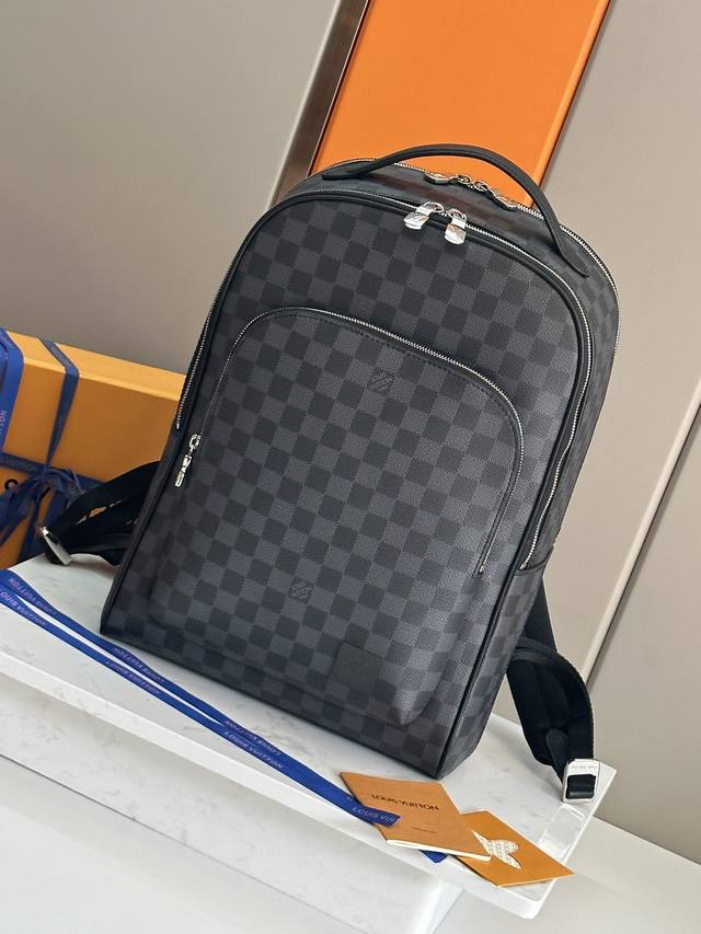 The original black grid Avenue backpack is made of Damier Graphite coated canva