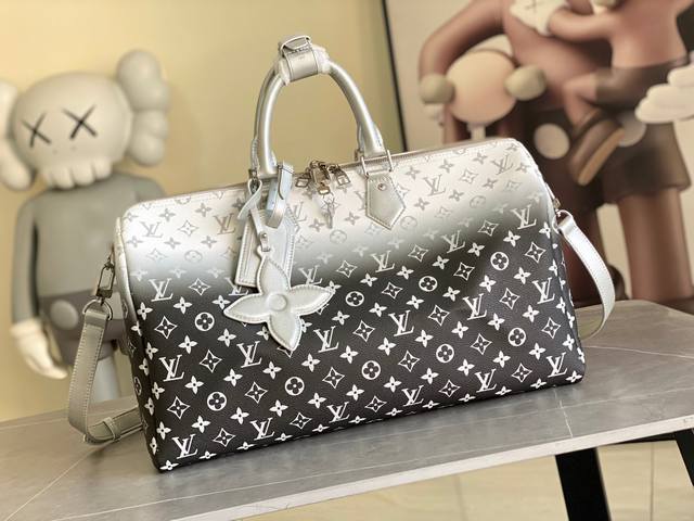 M12067 This Keepall Bandouli