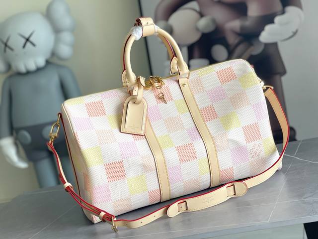 Price adjustment M40667 Green check M40713 Pink check This Keepall Bandouli