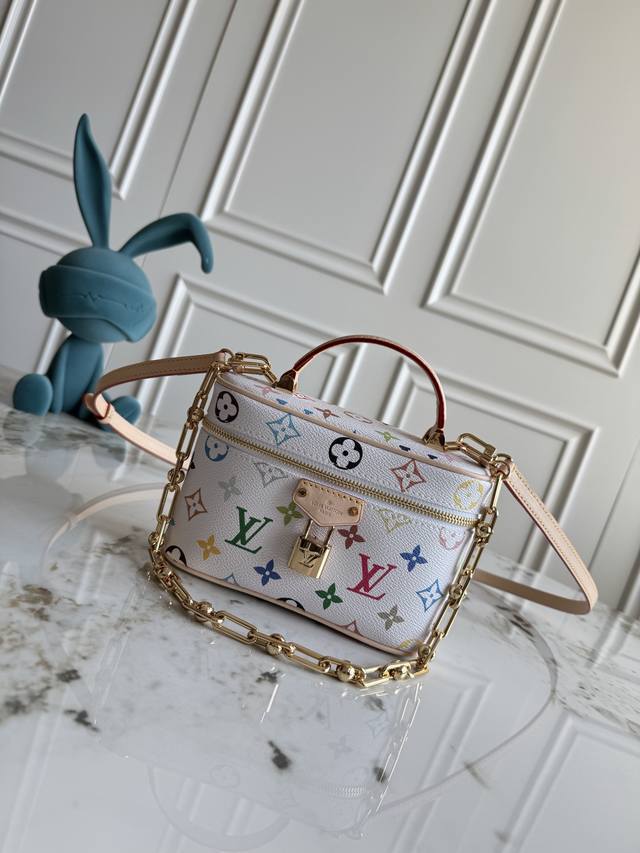 Exclusive background dynamic chip top original M13662 This Vanity Pouch handbag